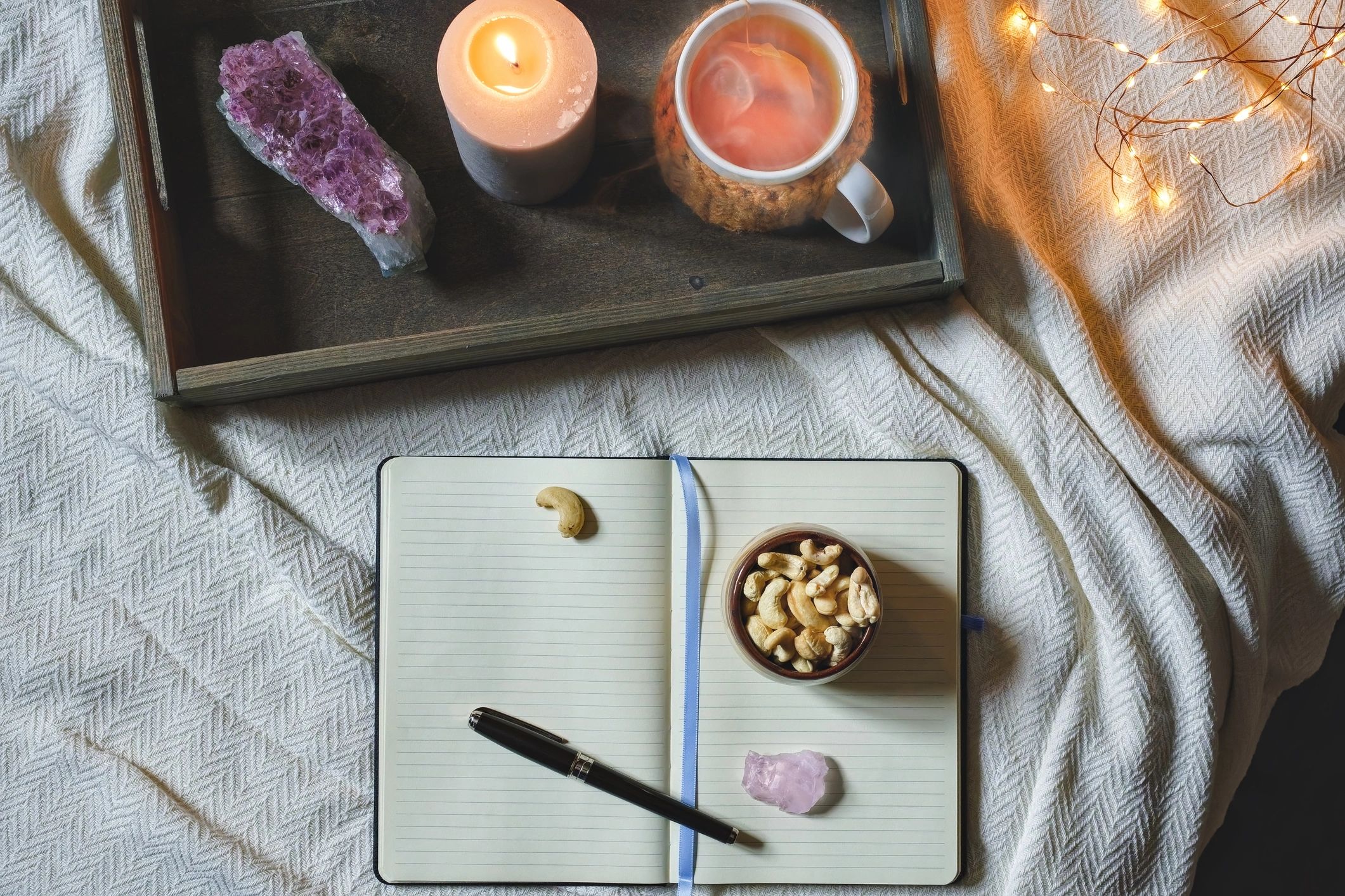 Journal and tea in a cozy setting